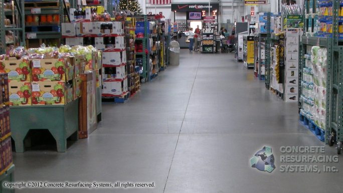 An aisle in a grocery store featuring polished concrete floors showcasing an array of numerous items.