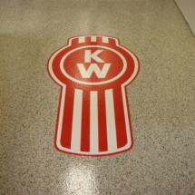 A floor with the logo of kw on it.