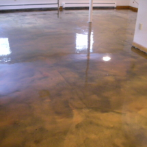 A room with a floor that has been polished.