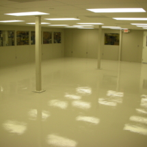 A room with white floors and walls.