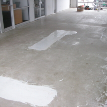 A room with white paint on the floor.