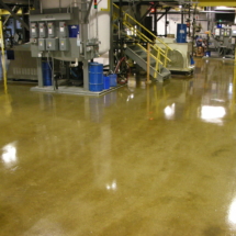 Clear Epoxy Sealed Concrete in a manufacturing facility